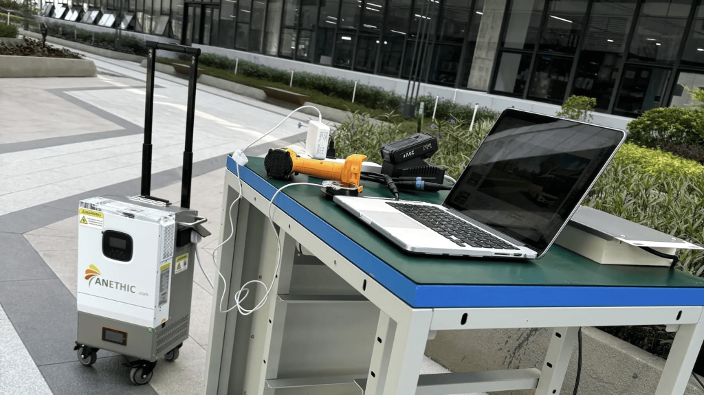 Laptop and equipment on outdoor table