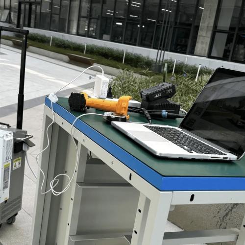Laptop and equipment on outdoor table